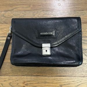 Vintage/antique Pioneer London black leather bag with strap and clasp closure